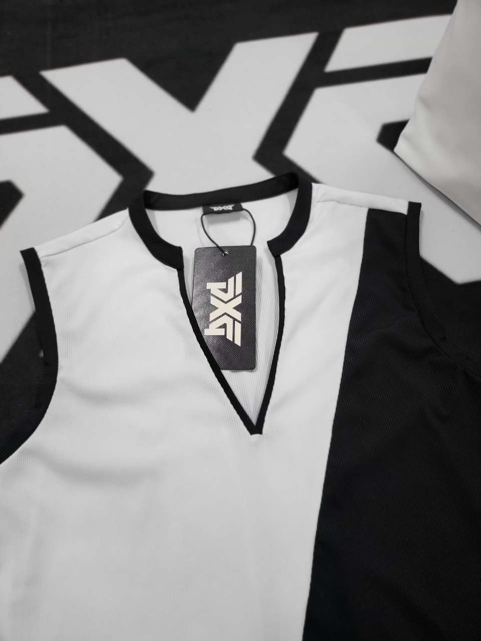 PXG Sleeveless Cross-Body Stripe 여성 골프 상의